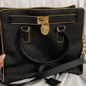 Black and gold Michael Kors bag